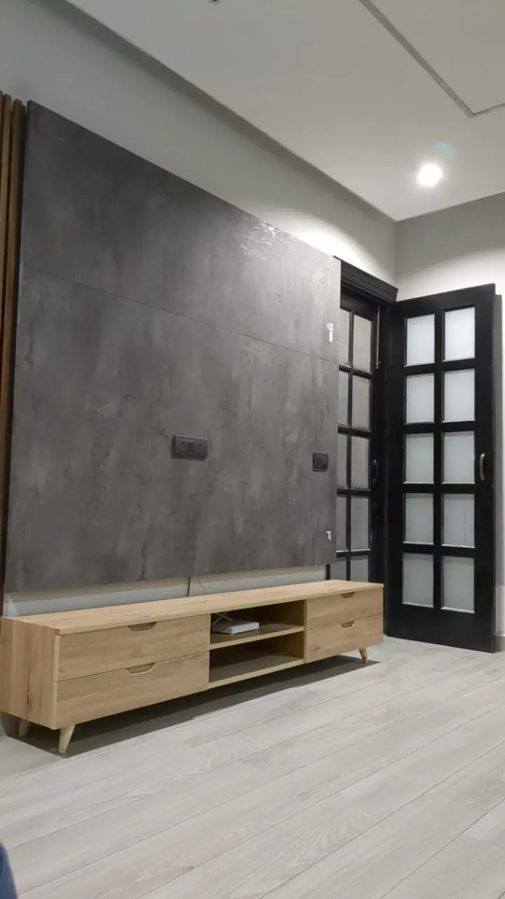 Grey feature wall and floating media console