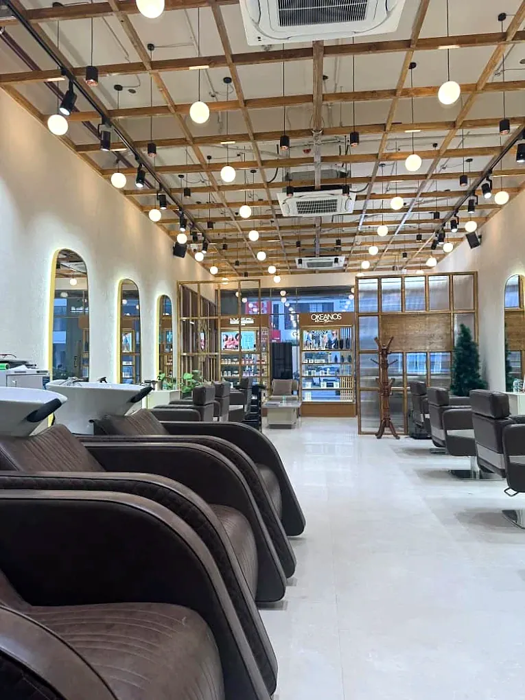 Essentia Salon styling chairs and warm ceiling lights