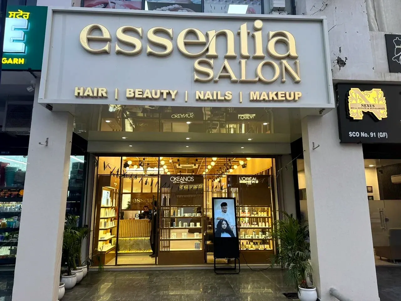 Essentia Salon exterior and illuminated storefront in New Chandigarh