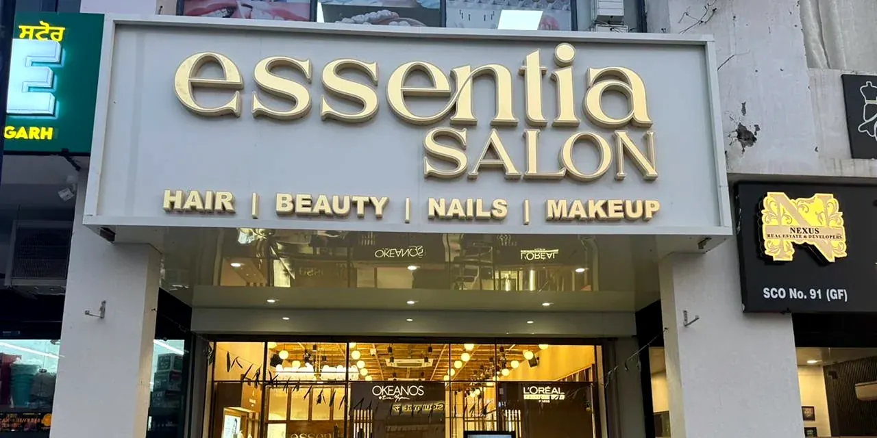 Color-balanced exterior photograph of the Essentia Salon storefront in New Chandigarh