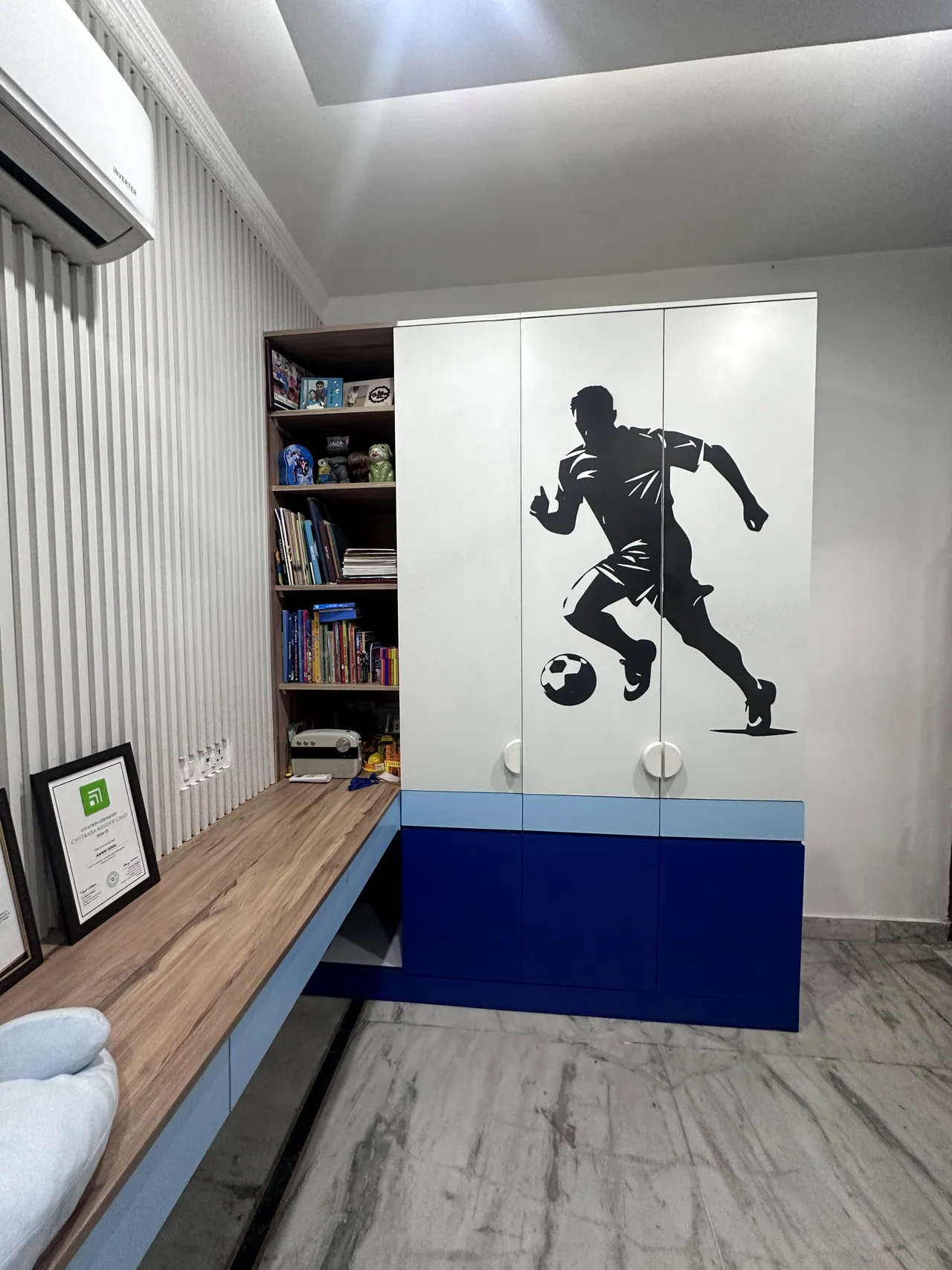 Window-side study desk with adjacent wardrobe storage