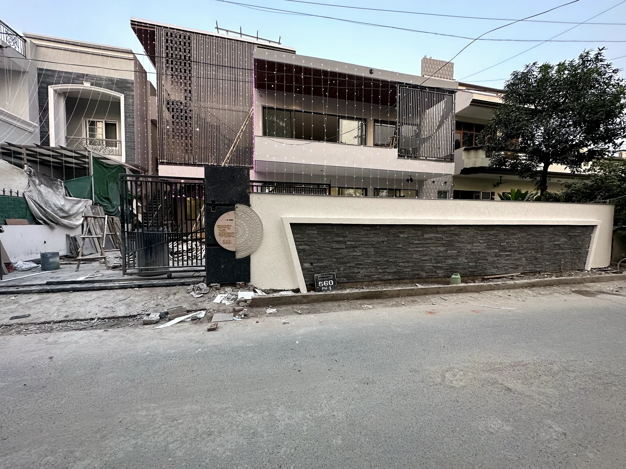 Street perspective of the residence and its front elevation