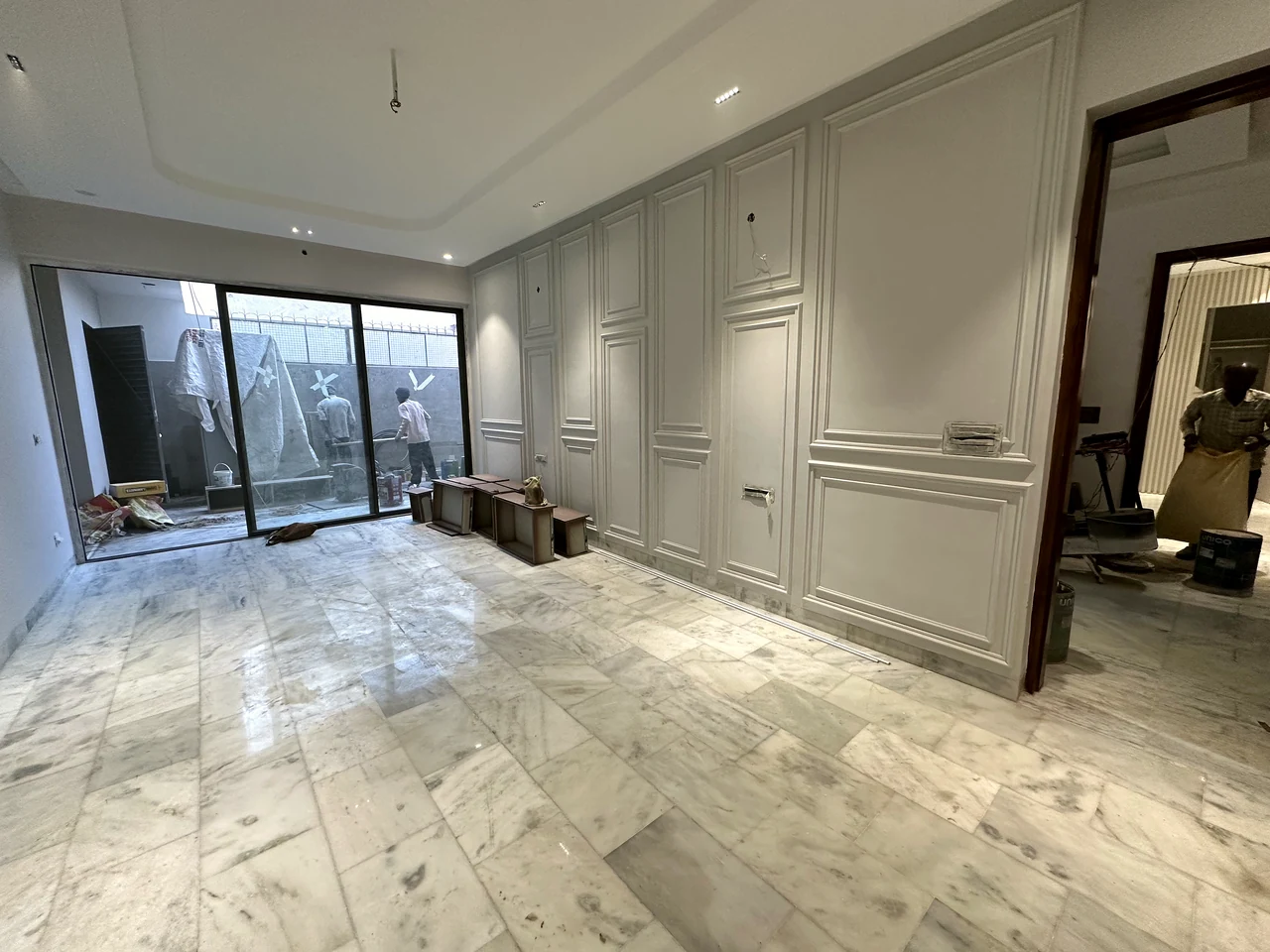 Living room panelling and floor finish during fit-out