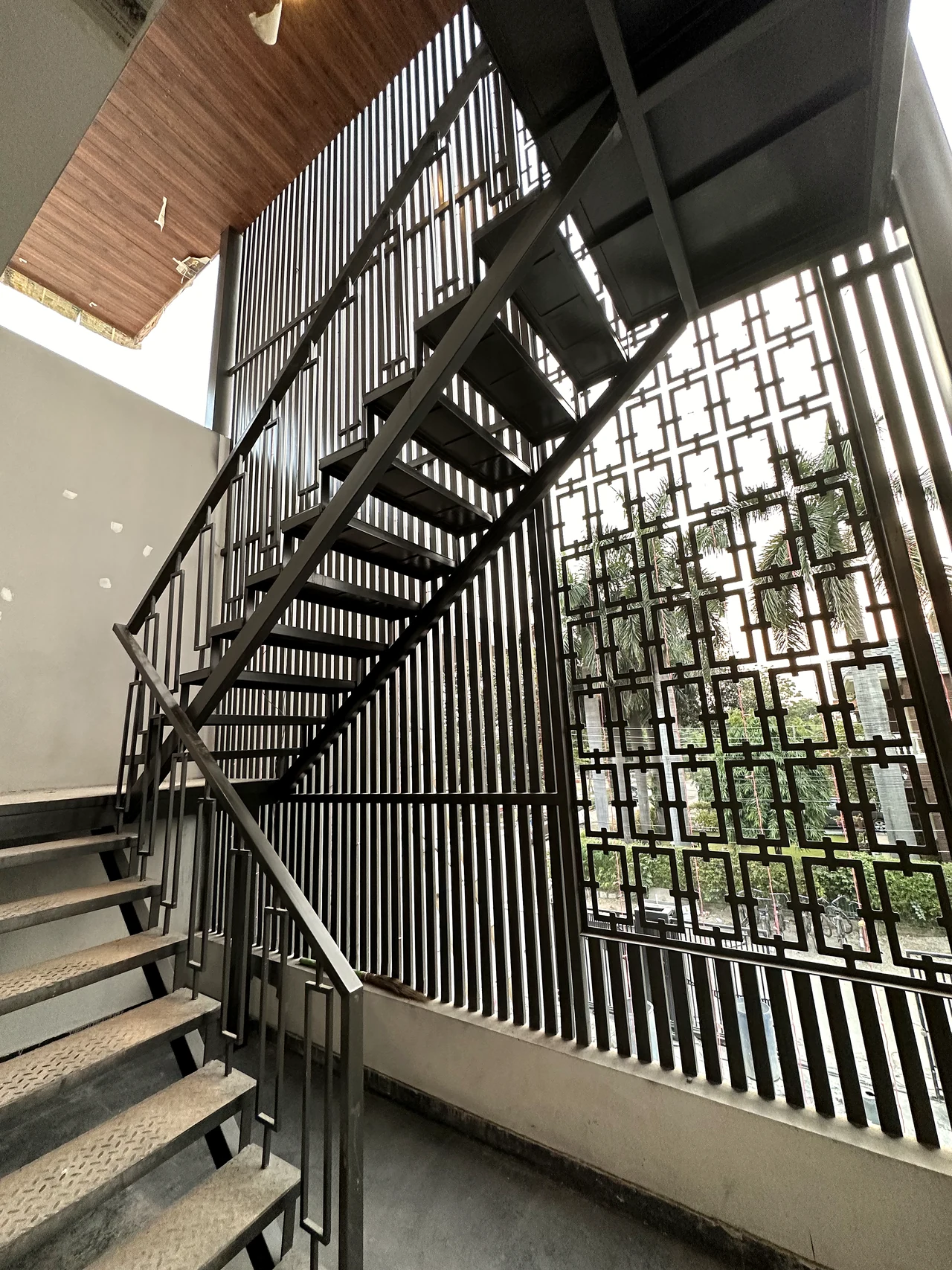 Second landing view showing the stair and screen pattern