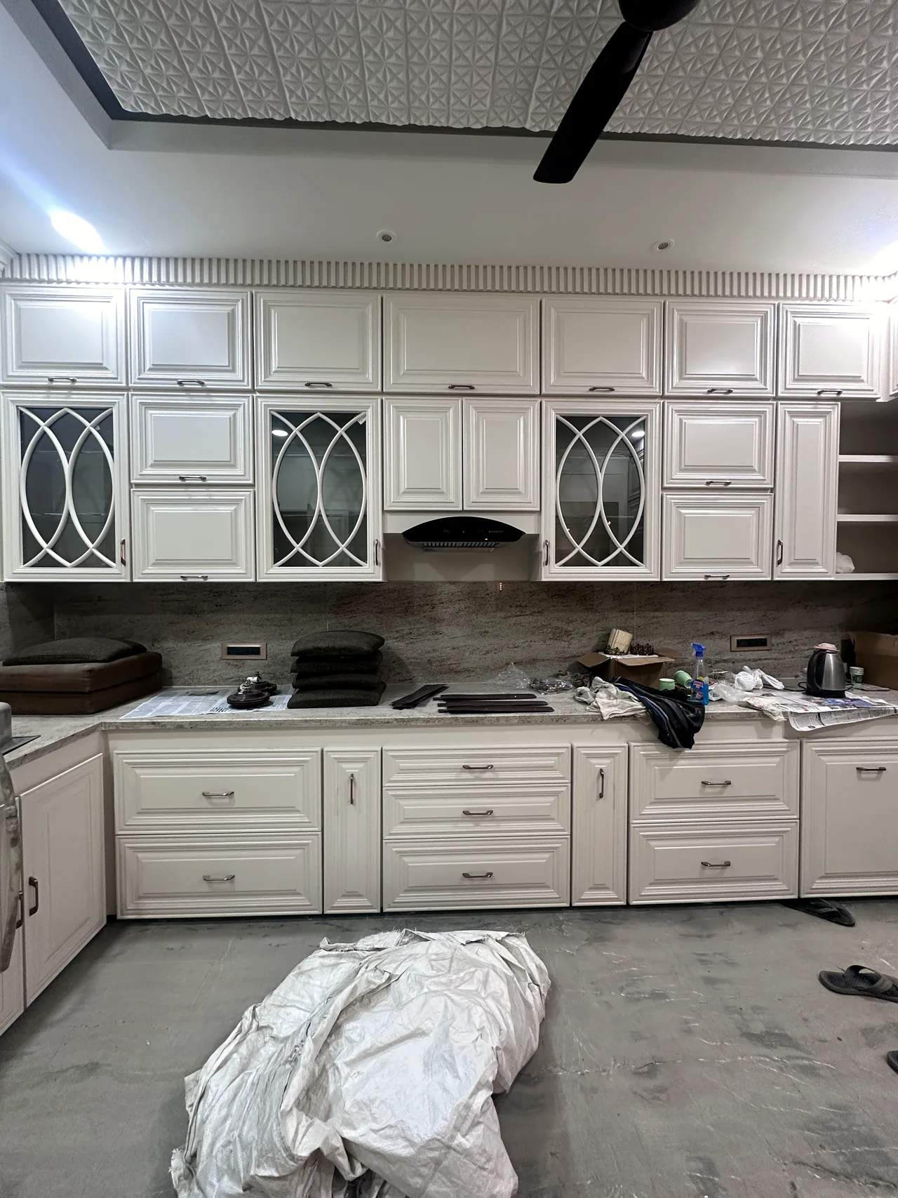 Kitchen cabinetry and worktop layout during installation