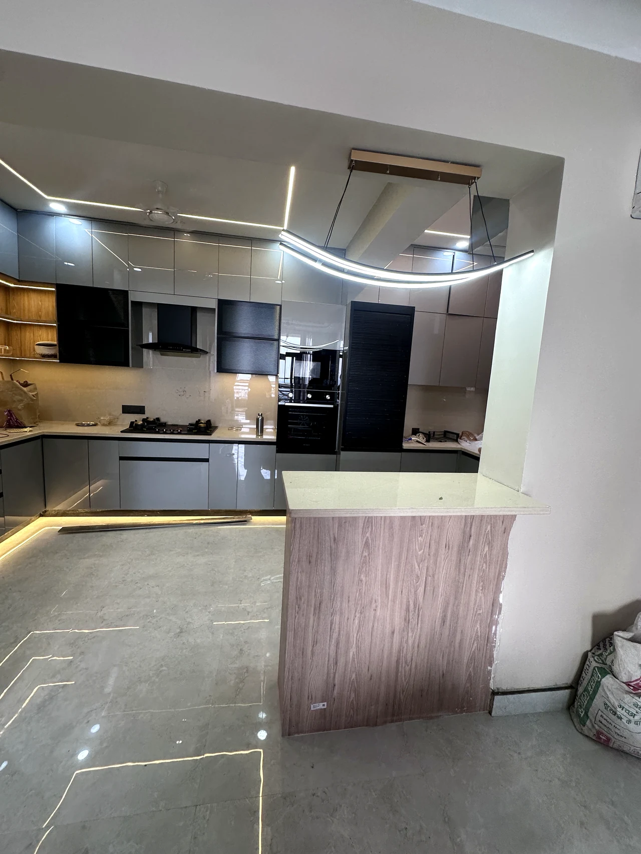 Kitchen island and built-in appliances in the open-plan home